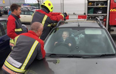 toddler delighted to be locked in car